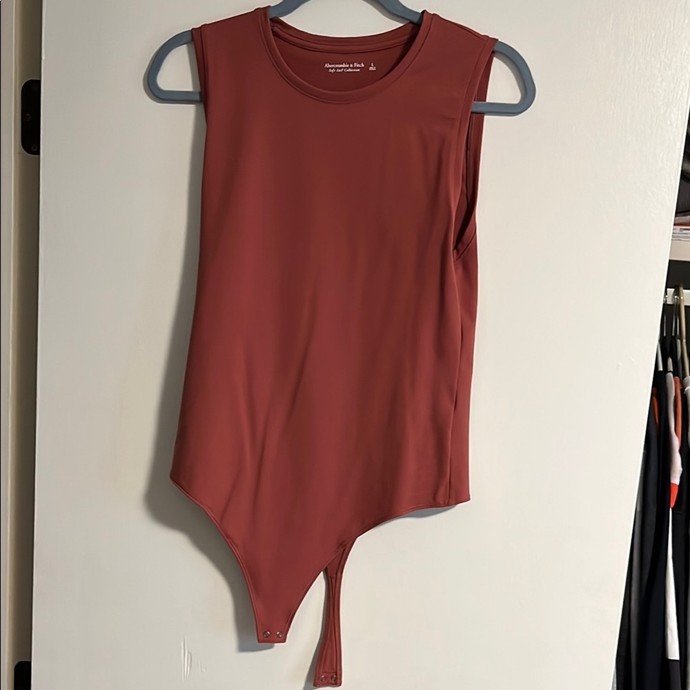 Women's Sleeveless Bodysuit in Rust by Aritzia